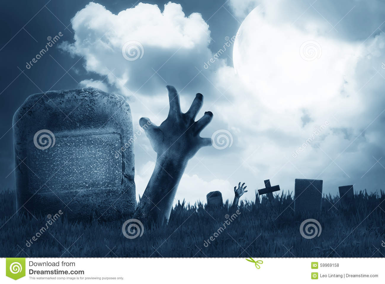 zombie-hand-out-graveyard-halloween-concept-59969158